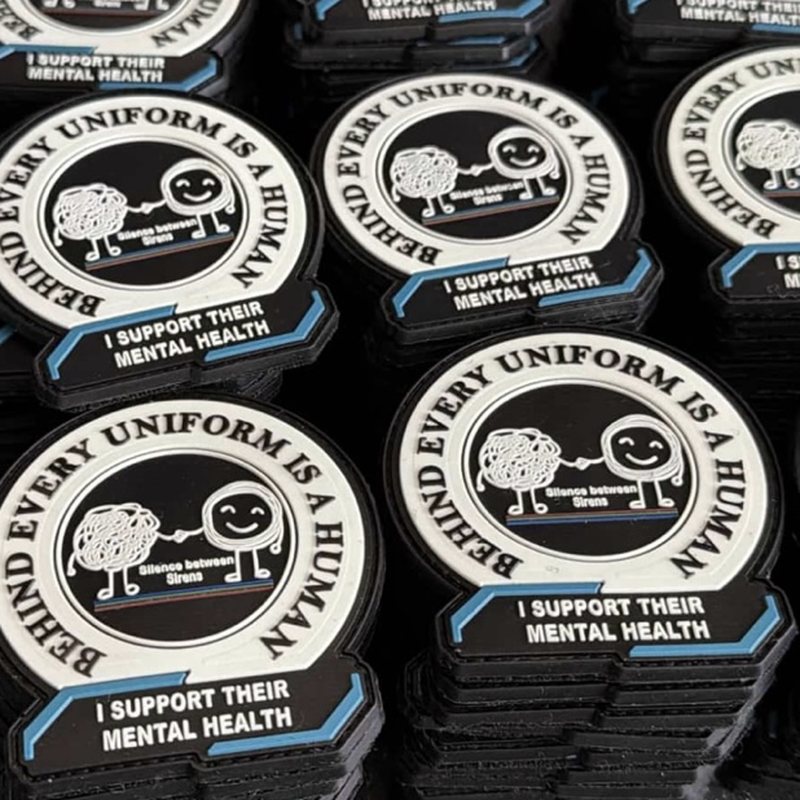 Silence Between Sirens patch reading Behind every uniform is a human, I support their mental health